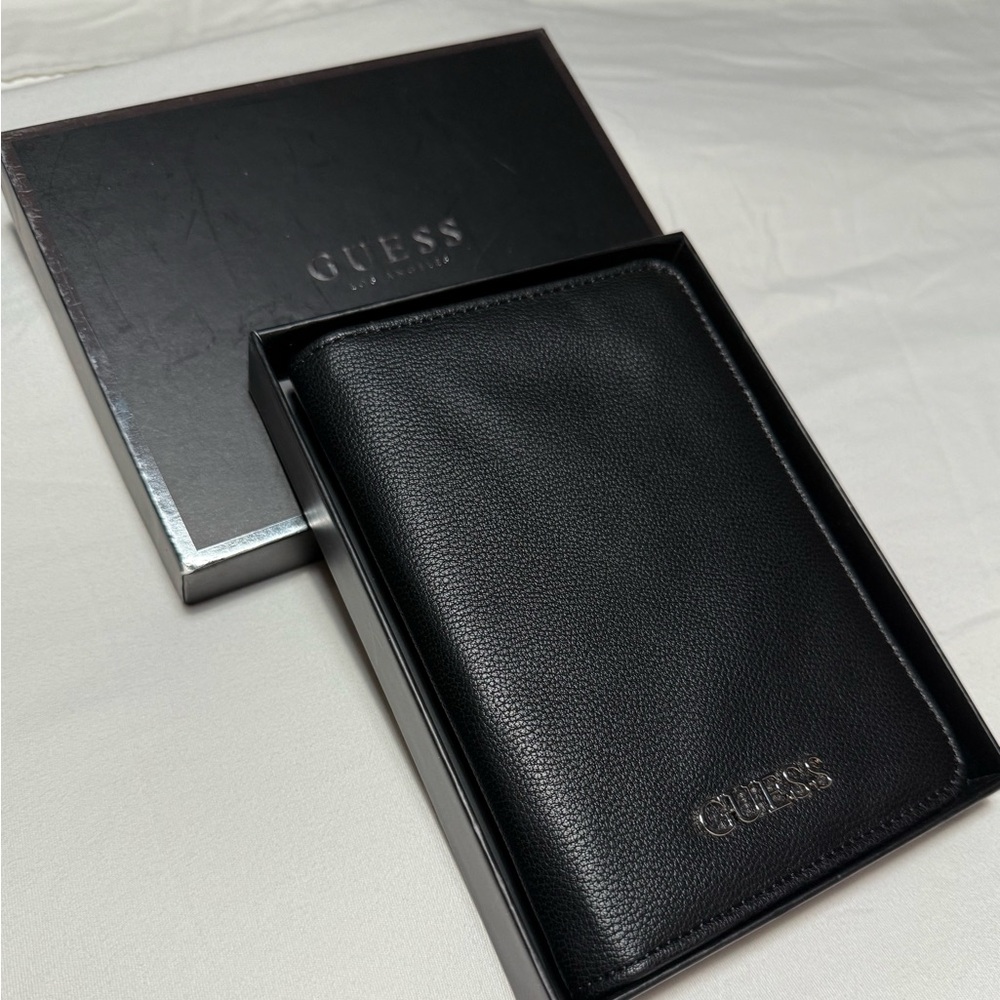 Guess  Leather wallet. Black,new with tags.